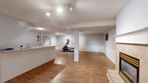 195 Becker Crescent, Fort Mcmurray, AB - Indoor Photo Showing Other Room With Fireplace