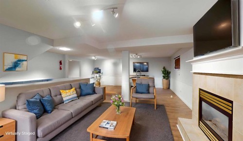 195 Becker Crescent, Fort Mcmurray, AB - Indoor Photo Showing Living Room With Fireplace