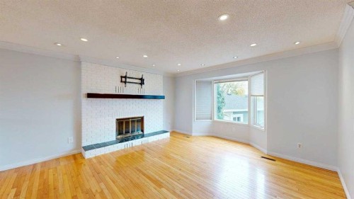 195 Becker Crescent, Fort Mcmurray, AB - Indoor Photo Showing Living Room With Fireplace