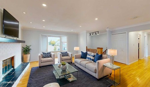 195 Becker Crescent, Fort Mcmurray, AB - Indoor Photo Showing Living Room With Fireplace