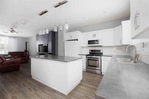 7423 Railway Avenue, Fort Mcmurray, AB - Indoor Photo Showing Kitchen With Double Sink