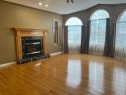 220 Boisvert Place, Fort Mcmurray, AB  - Indoor Photo Showing Living Room With Fireplace 