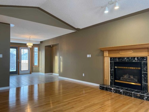 220 Boisvert Place, Fort Mcmurray, AB - Indoor Photo Showing Living Room With Fireplace
