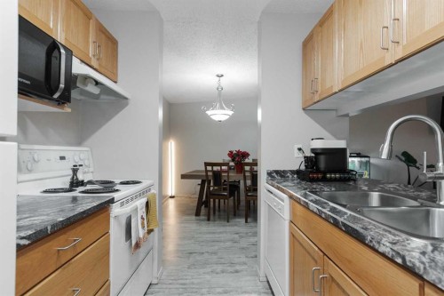 337-200 Richard Street, Fort Mcmurray, AB - Indoor Photo Showing Kitchen With Double Sink