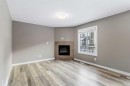 53-401 Athabasca Avenue, Fort Mcmurray, AB  - Indoor Photo Showing Living Room With Fireplace 