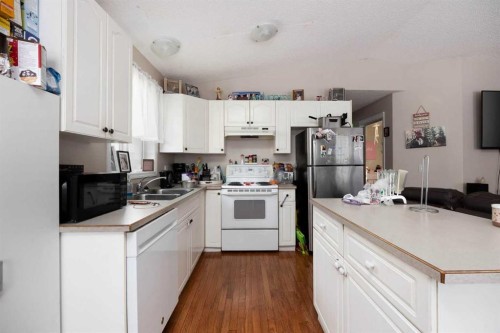 145 Laurier Road, Fort Mcmurray, AB - Indoor Photo Showing Kitchen With Double Sink