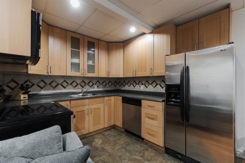 149 Magpie Street, Fort Mcmurray, AB - Indoor Photo Showing Kitchen With Double Sink