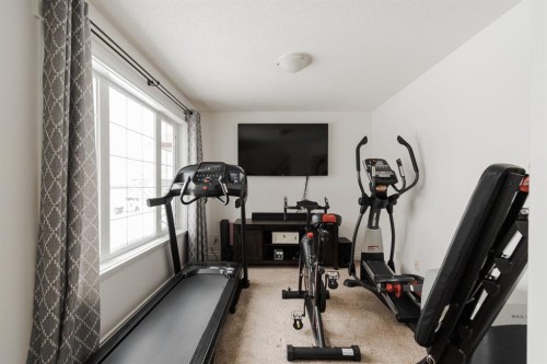 149 Magpie Street, Fort Mcmurray, AB - Indoor Photo Showing Gym Room