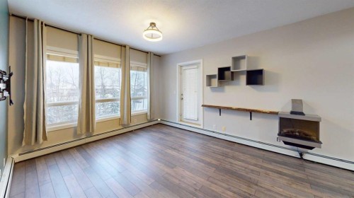 304-290 Plamondon Drive, Fort Mcmurray, AB - Indoor Photo Showing Other Room With Fireplace