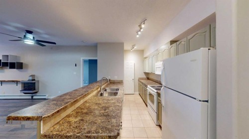 304-290 Plamondon Drive, Fort Mcmurray, AB - Indoor Photo Showing Kitchen