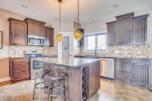 141 Huberman Way, Fort Mcmurray, AB - Indoor Photo Showing Kitchen With Stainless Steel Kitchen With Upgraded Kitchen