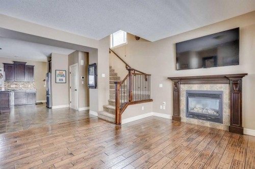 141 Huberman Way, Fort Mcmurray, AB - Indoor Photo Showing Living Room With Fireplace