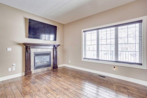 141 Huberman Way, Fort Mcmurray, AB - Indoor Photo Showing Living Room With Fireplace
