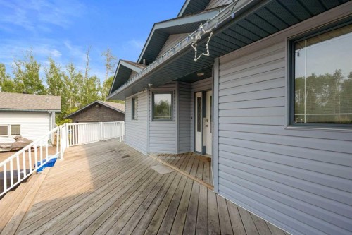 25 Freestone Way, Saprae Creek, AB - Outdoor With Deck Patio Veranda With Exterior