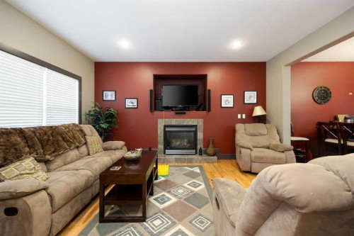144 Falcon Drive, Fort Mcmurray, AB - Indoor Photo Showing Living Room With Fireplace