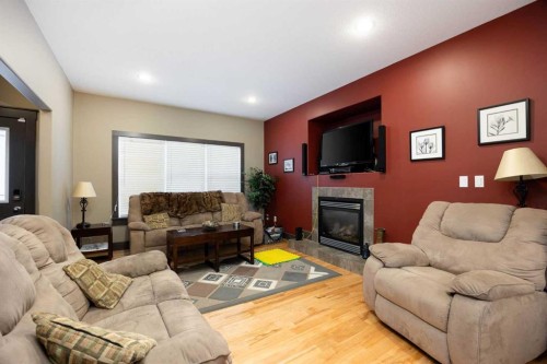 144 Falcon Drive, Fort Mcmurray, AB - Indoor Photo Showing Living Room With Fireplace