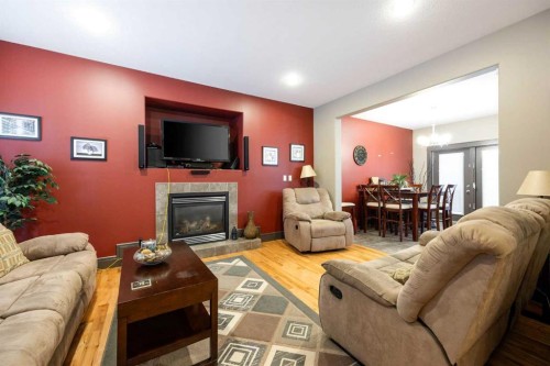 144 Falcon Drive, Fort Mcmurray, AB - Indoor Photo Showing Living Room With Fireplace