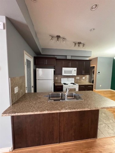 102-109 Fontaine Crescent, Fort Mcmurray, AB - Indoor Photo Showing Kitchen With Double Sink