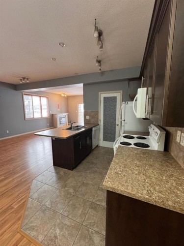 102-109 Fontaine Crescent, Fort Mcmurray, AB - Indoor Photo Showing Kitchen With Double Sink