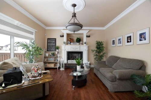 158 Pickles Crescent, Fort Mcmurray, AB - Indoor Photo Showing Living Room With Fireplace