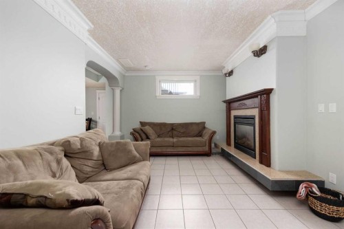 158 Pickles Crescent, Fort Mcmurray, AB - Indoor Photo Showing Living Room With Fireplace