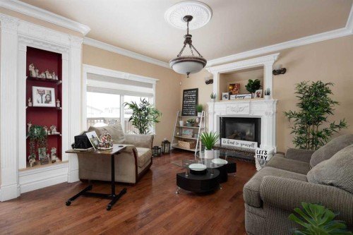 158 Pickles Crescent, Fort Mcmurray, AB - Indoor Photo Showing Living Room With Fireplace