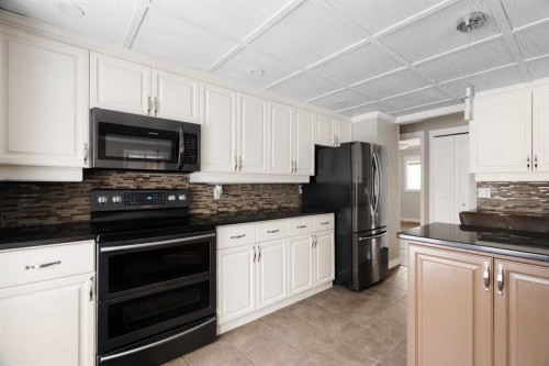 67 Fitzsimmons Avenue, Fort Mcmurray, AB - Indoor Photo Showing Kitchen