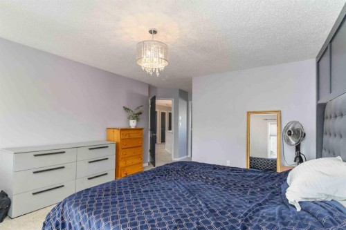 113 Bussieres Drive, Fort Mcmurray, AB - Indoor Photo Showing Bedroom