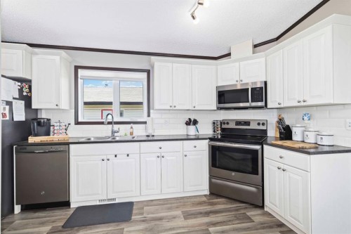 161 Card Crescent, Fort Mcmurray, AB - Indoor Photo Showing Kitchen With Double Sink