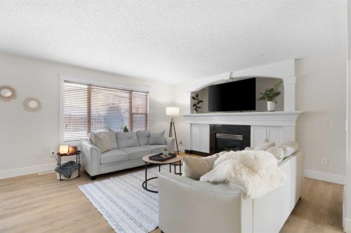 209 Parry Crescent, Fort Mcmurray, AB - Indoor Photo Showing Living Room With Fireplace