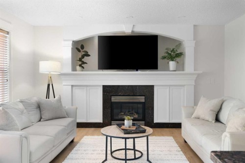 209 Parry Crescent, Fort Mcmurray, AB - Indoor Photo Showing Living Room With Fireplace