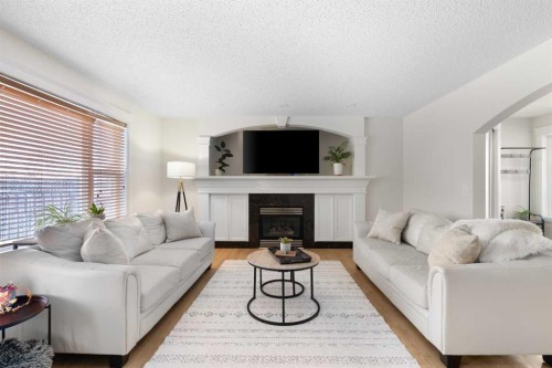 209 Parry Crescent, Fort Mcmurray, AB - Indoor Photo Showing Living Room With Fireplace