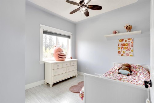 103 Donovan Drive, Anzac, AB - Indoor Photo Showing Bedroom