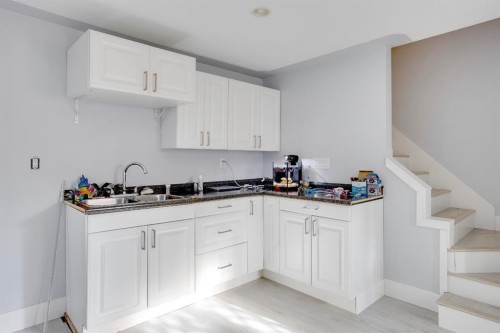 103 Donovan Drive, Anzac, AB - Indoor Photo Showing Kitchen With Double Sink