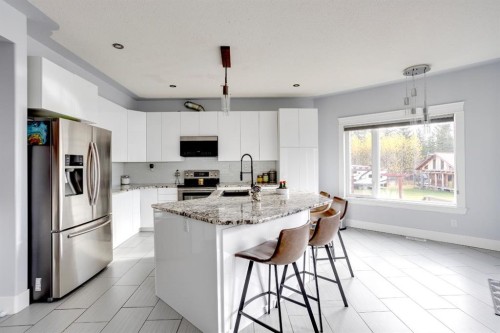 103 Donovan Drive, Anzac, AB - Indoor Photo Showing Kitchen With Stainless Steel Kitchen With Upgraded Kitchen