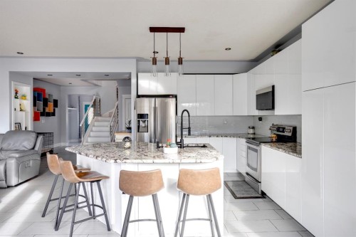 103 Donovan Drive, Anzac, AB - Indoor Photo Showing Kitchen With Stainless Steel Kitchen With Upgraded Kitchen