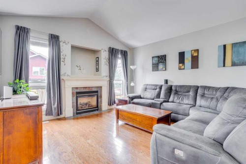 176 Maple Leaf Lane, Fort Mcmurray, AB - Indoor Photo Showing Living Room With Fireplace