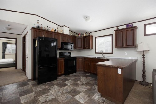 328 Grey Crescent, Fort Mcmurray, AB - Indoor Photo Showing Kitchen With Double Sink