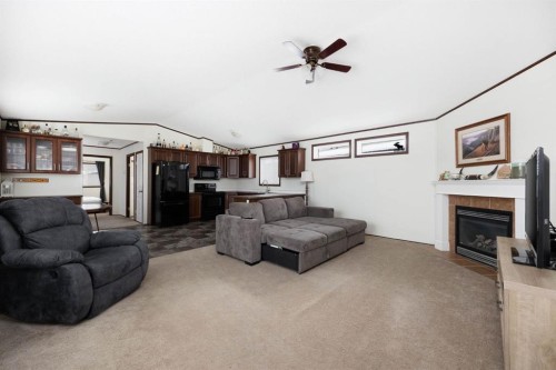 328 Grey Crescent, Fort Mcmurray, AB - Indoor Photo Showing Living Room With Fireplace