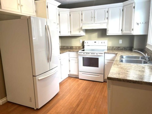 893 Timberline, Fort Mcmurray, AB - Indoor Photo Showing Kitchen With Double Sink