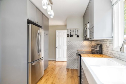 129 Ermine Crescent, Fort Mcmurray, AB - Indoor Photo Showing Kitchen With Double Sink