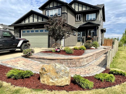 145 Cobblestone Bay, Fort Mcmurray, AB - Outdoor With Facade