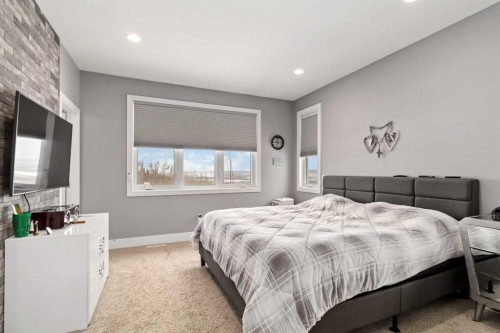 145 Cobblestone Bay, Fort Mcmurray, AB - Indoor Photo Showing Bedroom