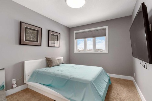 145 Cobblestone Bay, Fort Mcmurray, AB - Indoor Photo Showing Bedroom