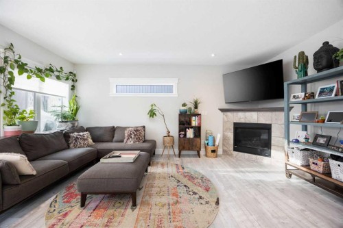 141 Pearson Drive, Fort Mcmurray, AB - Indoor Photo Showing Living Room With Fireplace