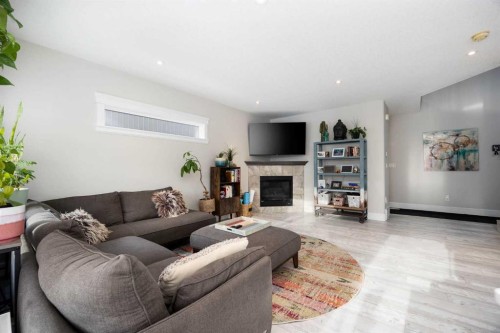 141 Pearson Drive, Fort Mcmurray, AB - Indoor Photo Showing Living Room With Fireplace