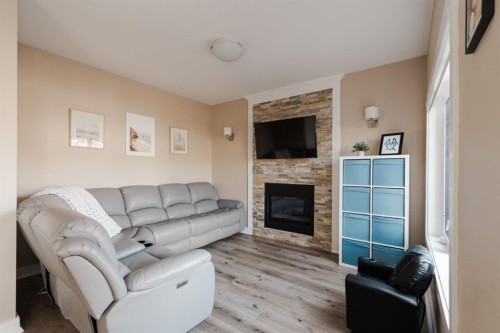 181 Diamondstone Ridge, Fort Mcmurray, AB - Indoor Photo Showing Living Room With Fireplace