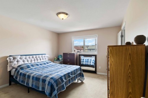 228 Paris Crescent, Fort Mcmurray, AB - Indoor Photo Showing Bedroom