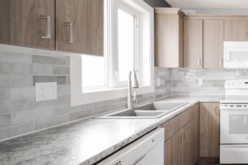 157 Swanson Crescent, Fort Mcmurray, AB - Indoor Photo Showing Kitchen With Double Sink