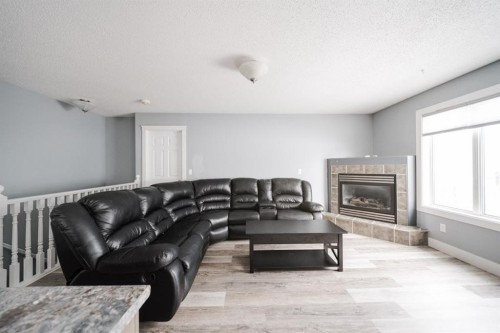 157 Swanson Crescent, Fort Mcmurray, AB - Indoor Photo Showing Living Room With Fireplace